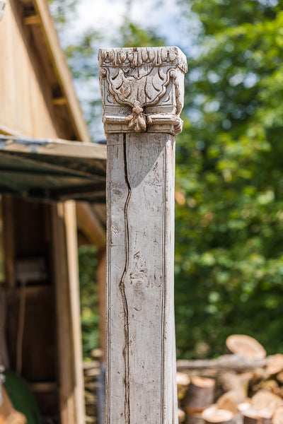 A pair of Indian Hardwood Corinthian Style Columns