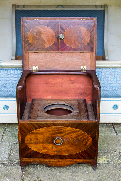 Commode with top open