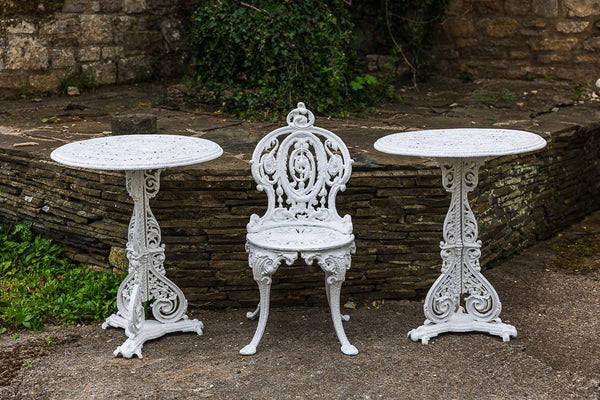 A Pair of Painted Cast Iron Tables