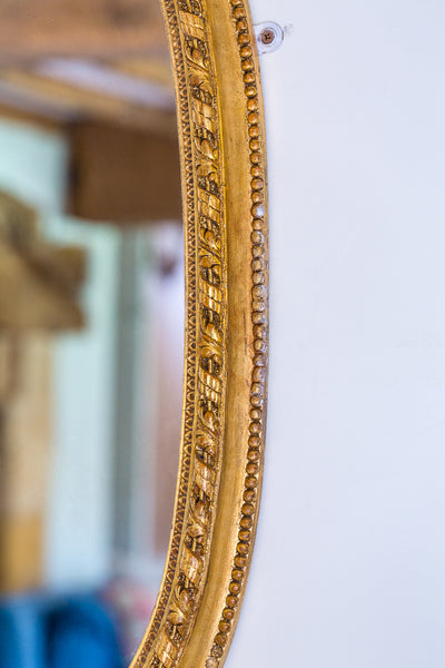 Antique French gesso oval mirror side detail
