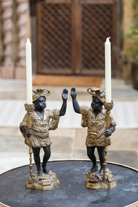 Offbeat Interiors - A Pair of Spelter Blackamore Figural Candlesticks