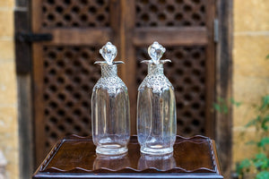 Offbeat Interiors - A Pair of Victorian Silver Mounted Decanters and Stoppers
